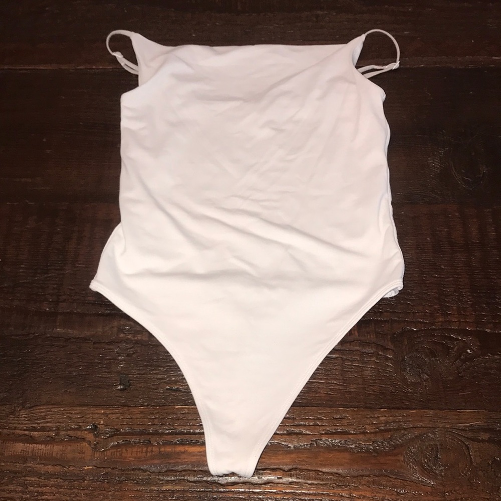 Thong body suit